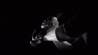Close up of hands gripping a baseball bat