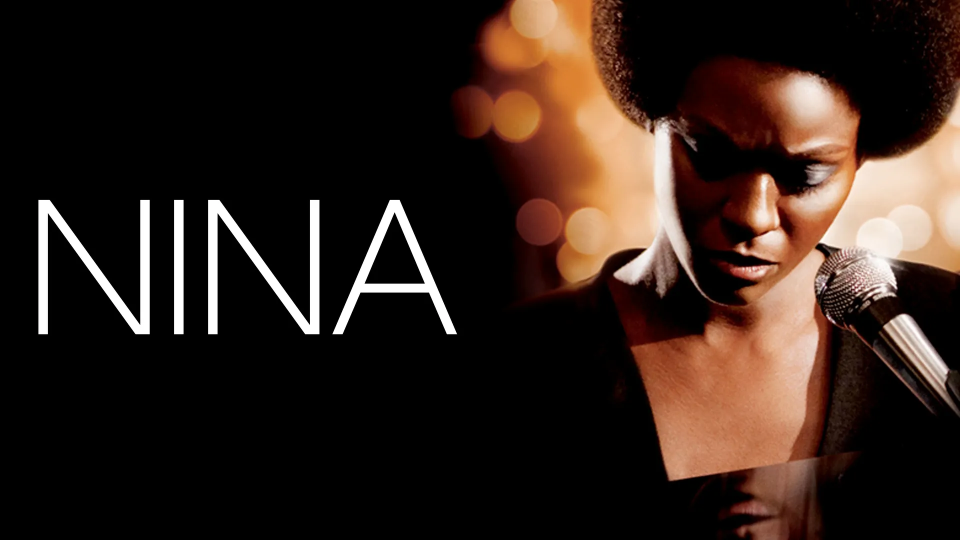 Nina Simone performing with a microphone