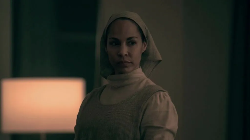 A still image of Amanda Brugel as Rita Blue in The Handmaid’s Tale.